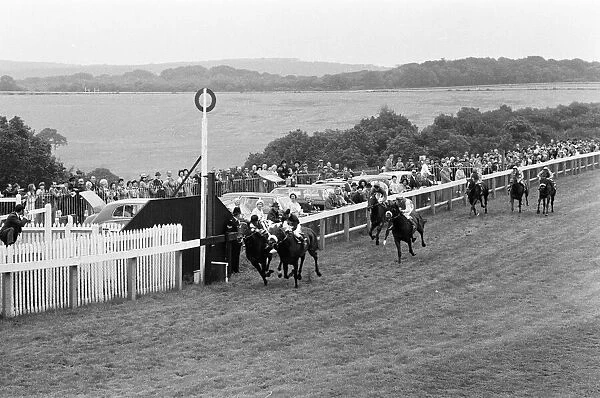 Scenes during the second day of Glorious Goodwood. Scobie Breasley passing the post