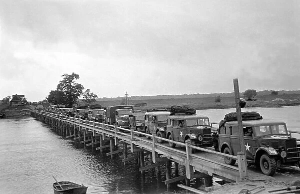 Scenes showing line of armured cars crossing the River as the British Army occupied