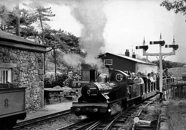 One of the scheduled services sets off on the Eskdale miniature railway on 26 May 1976
