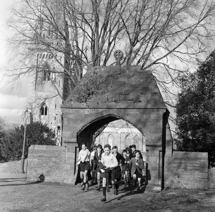 Framed Print : Scholars and choirboys of Llandaff Cathedral, South Wales, on their way to play rugby Framed Print : Scholars and choirboys of Llandaff Cathedral, South Wales, on their way to play rugby