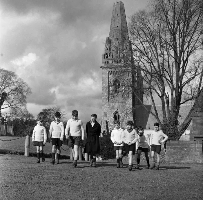 Framed Print : Scholars and choirboys of Llandaff Cathedral, South Wales, on their way to play rugby Framed Print : Scholars and choirboys of Llandaff Cathedral, South Wales, on their way to play rugby