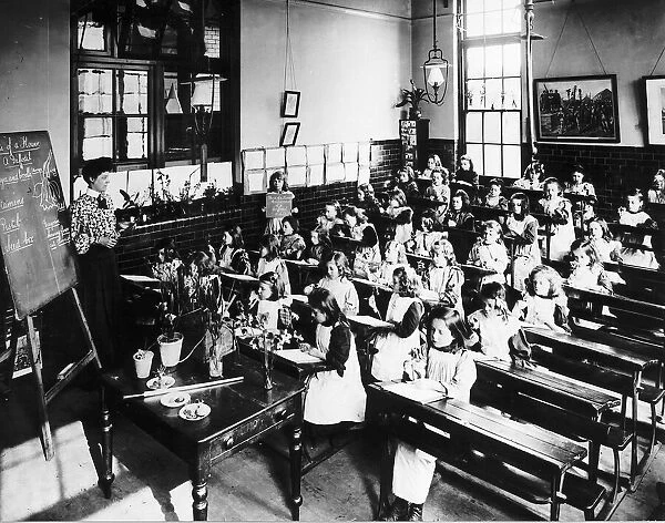 Schoolchildren attending a small villiage school at the turn of the 20th Century