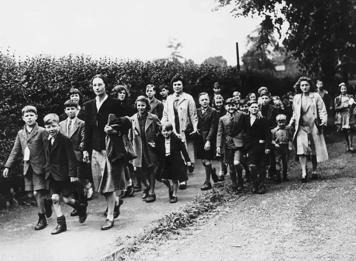 Framed Print : Schoolchildren evacuated from the major towns walk through Wilmslow in Cheshire Framed Print : Schoolchildren evacuated from the major towns walk through Wilmslow in Cheshire