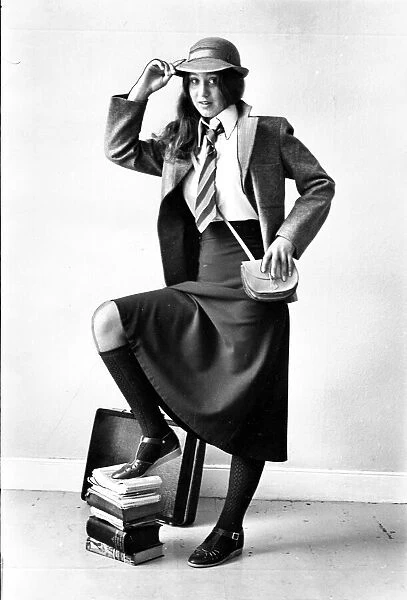 A schoolgirl posing in her smart school uniform