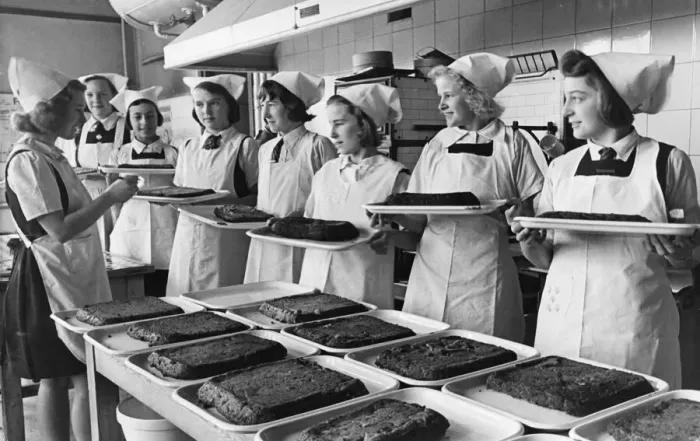 Framed Print : Schoolgirls serve meals to children during the Second World War. 28th October 1941 Framed Print : Schoolgirls serve meals to children during the Second World War. 28th October 1941