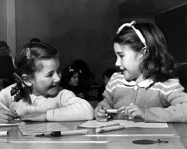 Schools - School Children - Classroom - Jan 1954 2 young girls in