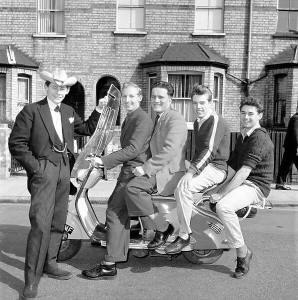 Scooter: Martin Coleman seen here with a group of men on his Lambretta scooter