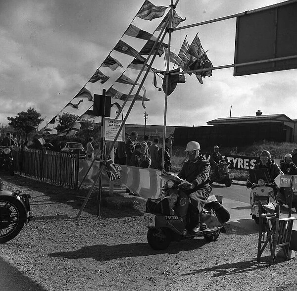 Scooter rally 1958 Scooters crossing Start Finish 'Last one there