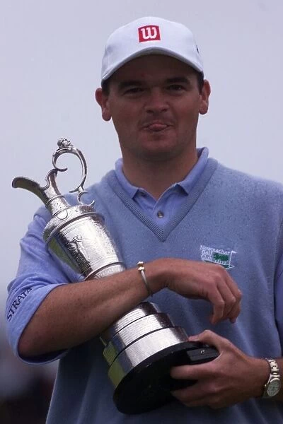 Scotlands Paul Lawrie holding the claret jug after winning the 1999 British Open
