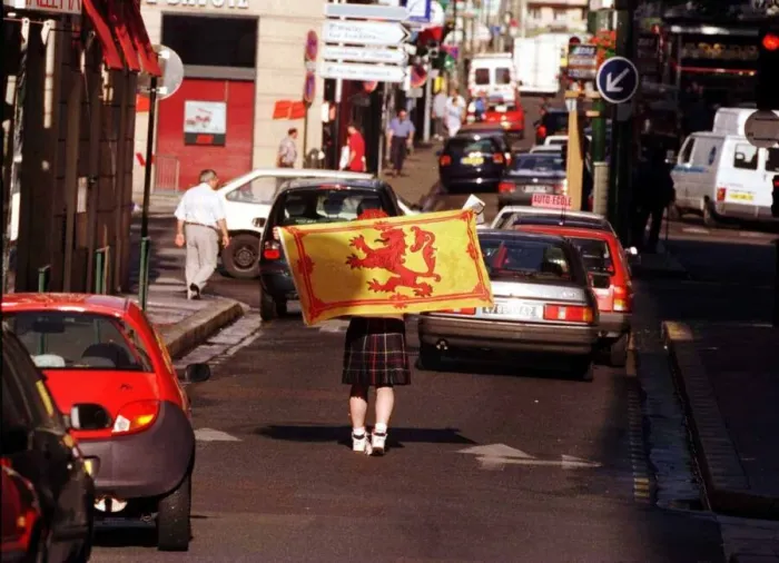 Framed Print : Scots Fan World Cup France 1998 Football Walking middle of road wearing a