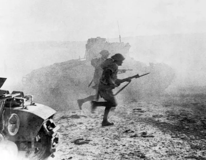 Framed Print : Scots guards go into action at El Alamein. The guards move forward under the protection Framed Print : Scots guards go into action at El Alamein. The guards move forward under the protection