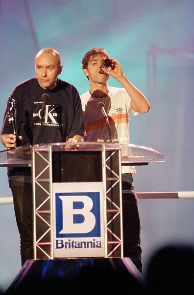 Scottish author of Trainspotting, Irvine Welsh, and Damon Albarn of Blur on stage at The