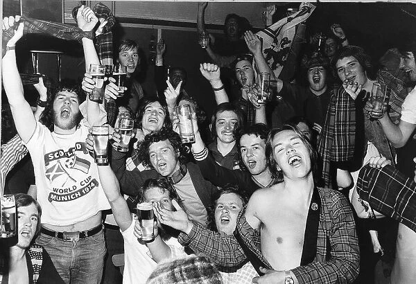 Scottish football fans celebrate in a Frankfurt bar at the 1974 World Cup
