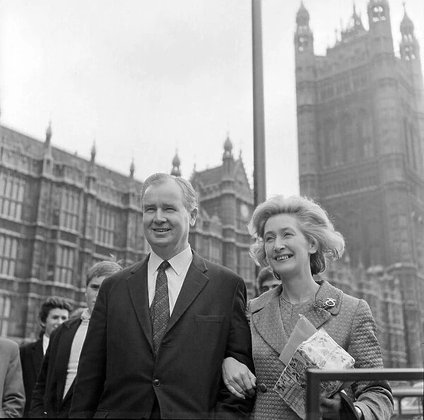 Scottish Nationalist MP Winnie Ewing stands outside the House of Commons with one of her