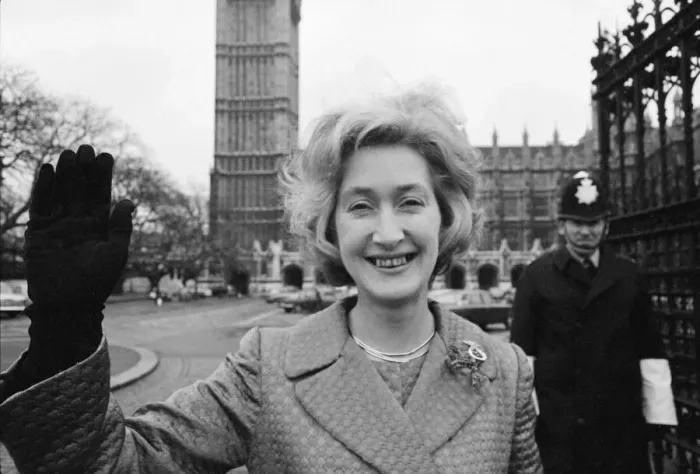 Framed Print : Scottish Nationalist MP Winnie Ewing waves as she stands outside the House of Commons Framed Print : Scottish Nationalist MP Winnie Ewing waves as she stands outside the House of Commons