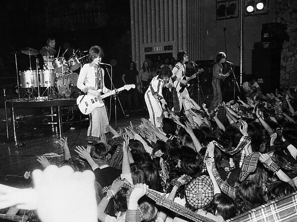 Scottish pop group Bay City Rollers in concert, circa May 1975