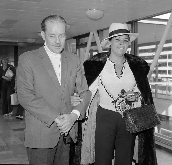 Scottish thriller writer Alistair MacLean with his wife Mary Marcelle Maclean leave