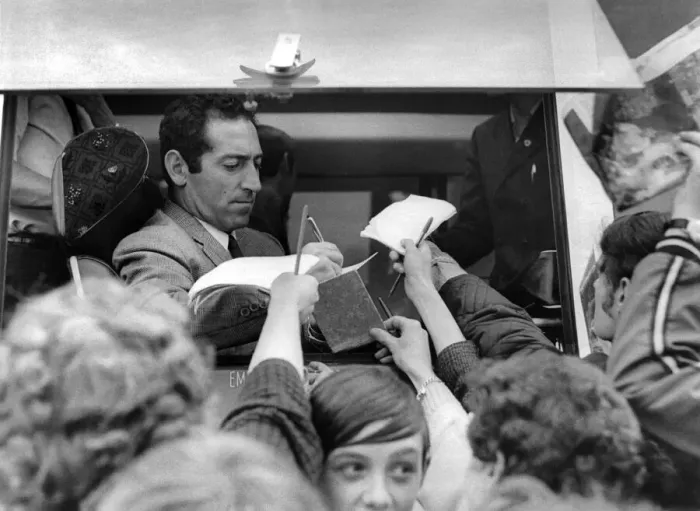 Framed Print : Scrambling for a survivors signature. Francisco Gento, the only man left from the real