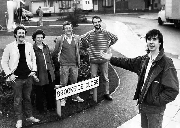 Scriptwriter Phil Redmond with cast members for his new Channel Four soap opera Brookside