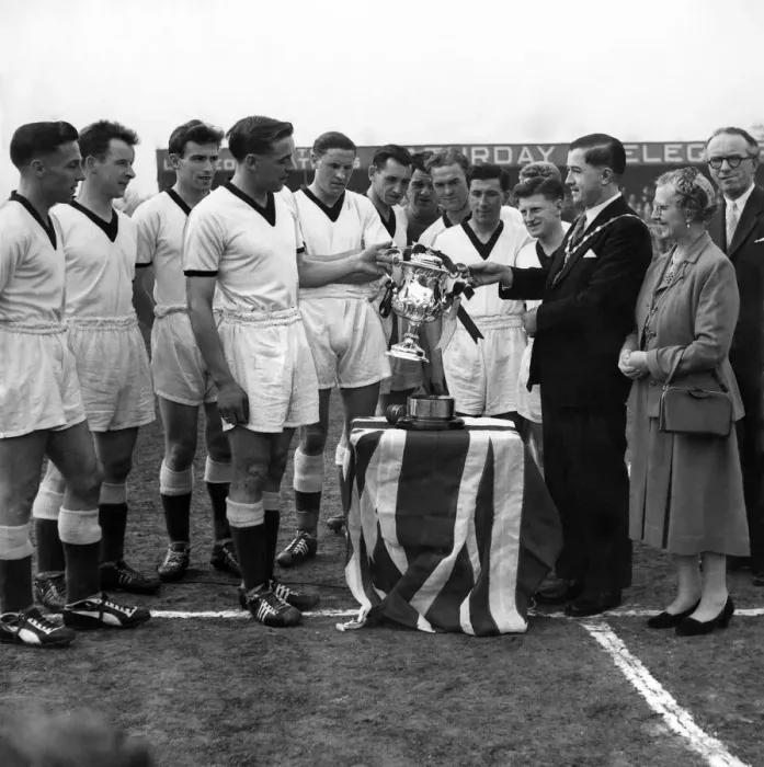 Framed Print : Scunthorpe United are presented the Lincolnshire Senior Cup trophy following their Framed Print : Scunthorpe United are presented the Lincolnshire Senior Cup trophy following their