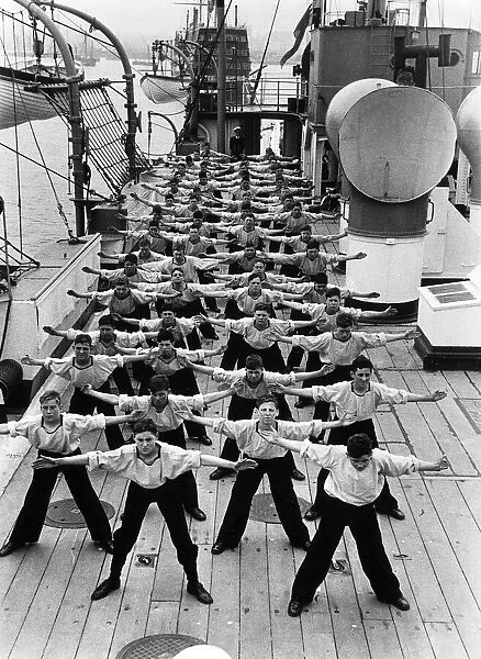 Sea Cadets run through an exercise routine on the deck of SS Warspite August 1938