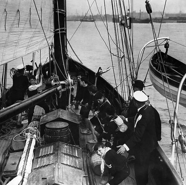 Sea Scouts hard at work on board the vessel given to them by The Daily Mirror