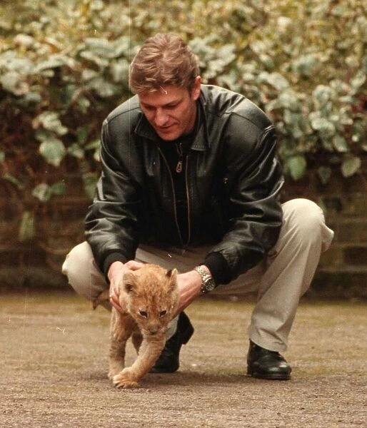 Sean Bean Actor at his Totteridge Home in Shillingford holding a lion cub