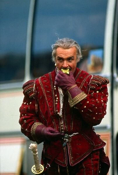 Sean Connery eating an apple on set of film Highlander in costume Circa May 1985