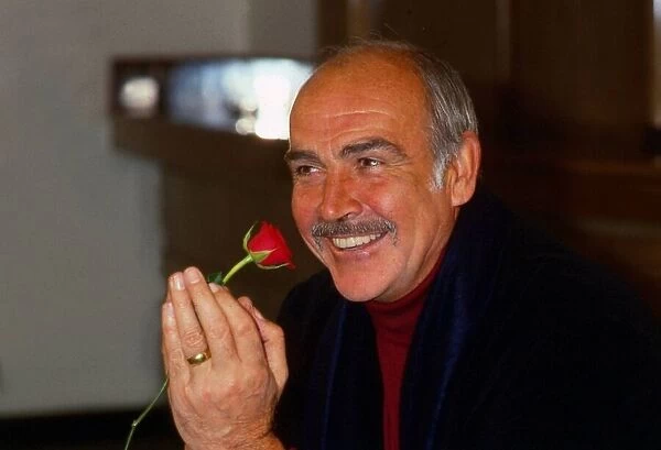 Sean Connery holding rose January 1990