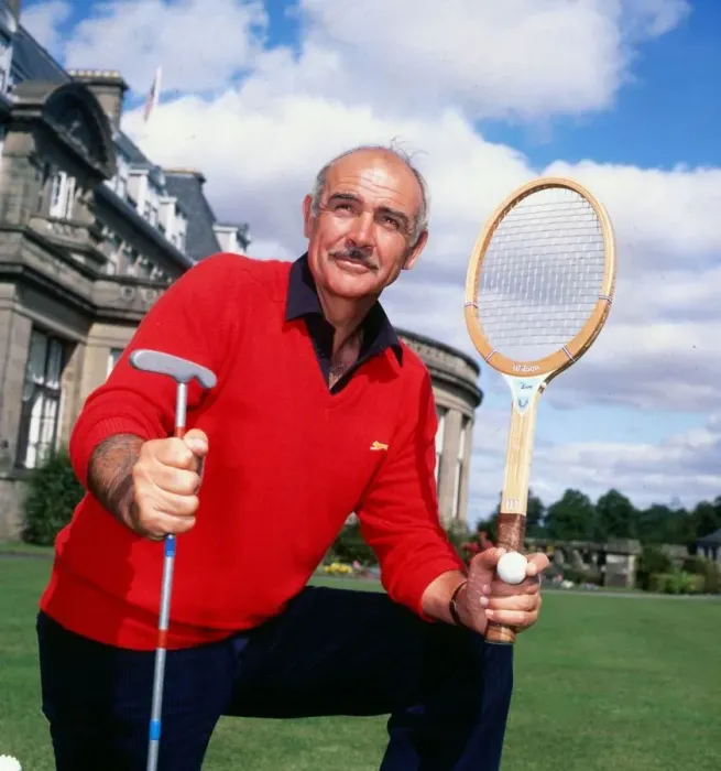 Framed Print : Sean Connery holding tennis raquet and golf club August 1981