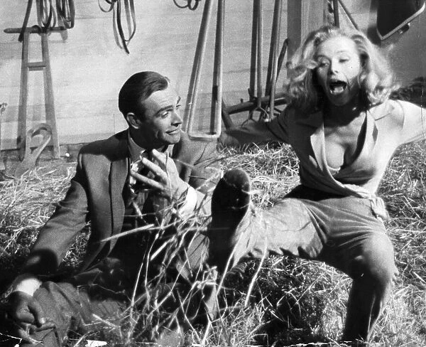 Sean Connery and Honor Blackman during filming of Goldfinger - June 1964