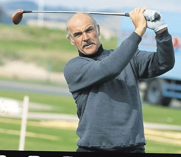 Sean Connery swinging golf club Gleneagles