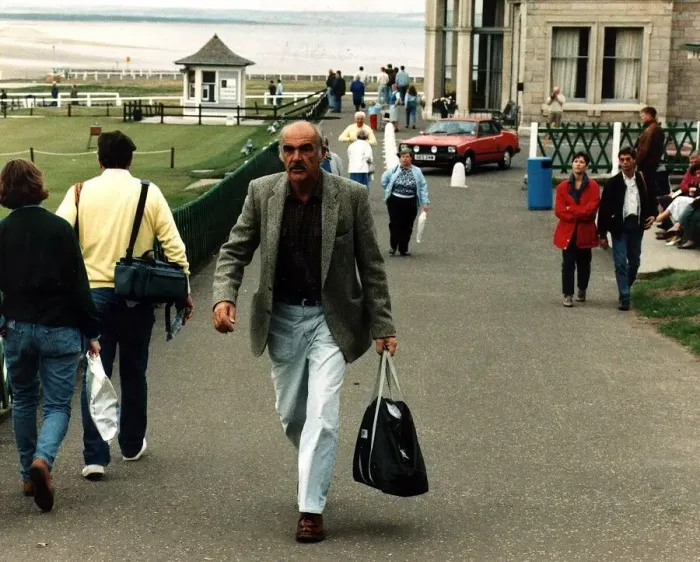 Framed Print : Sean Connery walking up street