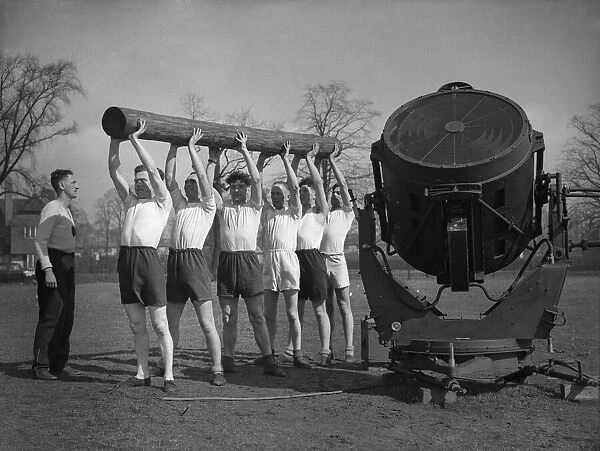 Searchlight school, Birmingham. Physical training being given to the soldiers of a