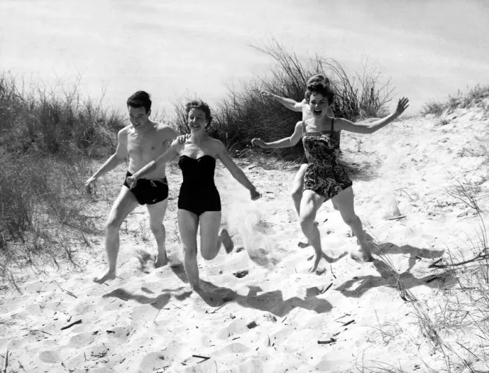 Framed Print : Seaside - running in the sand Friends chasing each other at the beach in Ostend Framed Print : Seaside - running in the sand Friends chasing each other at the beach in Ostend