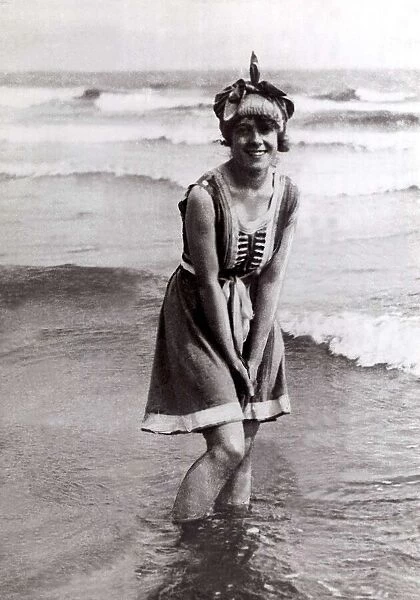 Seaside Scene 1915 Woman standing in sea with 1910s fashion Clothing