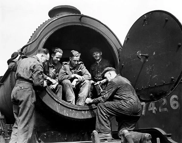 Seated comfortably in the presumably cold smokebox, army trainees watch their instructor