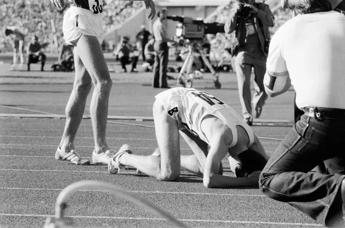 Framed Print : Sebastian Coe collapses to the ground with relief after winning the Mens 1500 metres