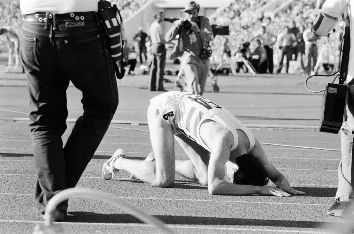 Framed Print : Sebastian Coe collapses to the ground with relief after winning the Mens 1500 metres Framed Print : Sebastian Coe collapses to the ground with relief after winning the Mens 1500 metres