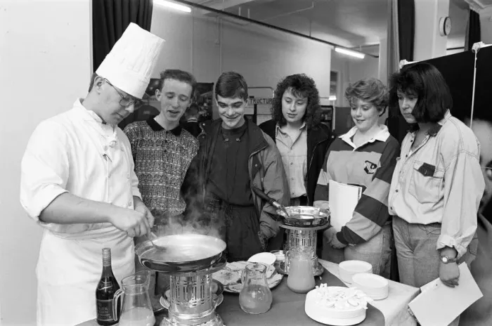 Framed Print : Second year student Simon Taylor makes flamb? pancakes in brandy for school pupils Framed Print : Second year student Simon Taylor makes flamb? pancakes in brandy for school pupils