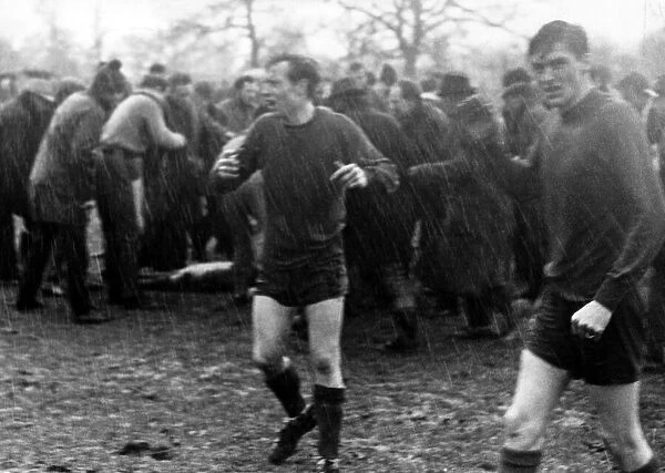 Seconds after a lightning flash leaves unconscious players lying stunned in the mud