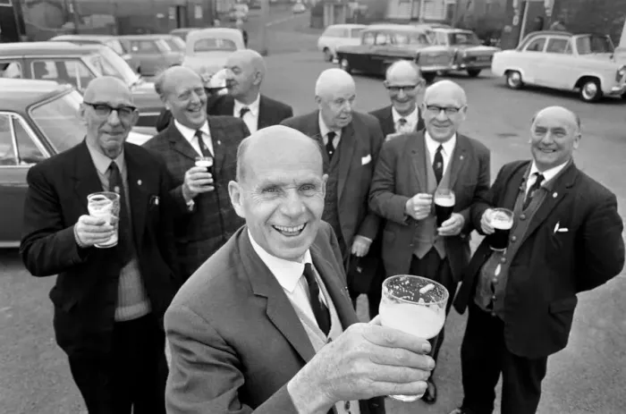 Framed Print : Secretary of the Bald Head d Mens Club Vic Hinds with some of his members outside