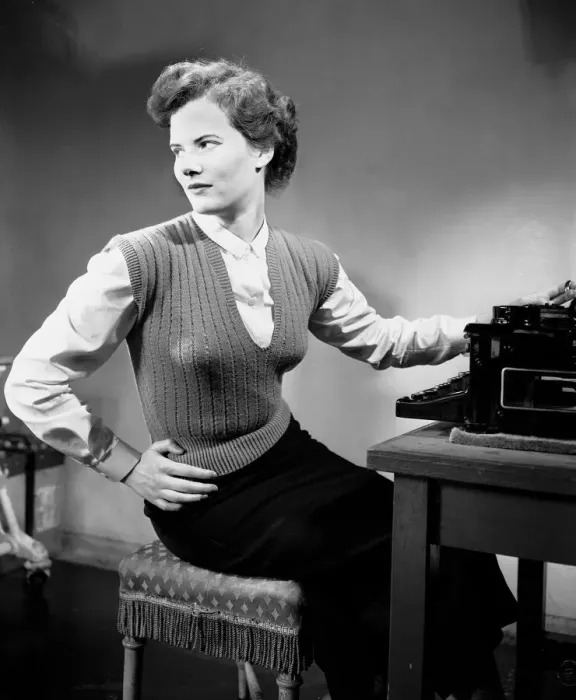 Framed Print : A secretary standing beside the typewriter in her office. June 1952 Framed Print : A secretary standing beside the typewriter in her office. June 1952