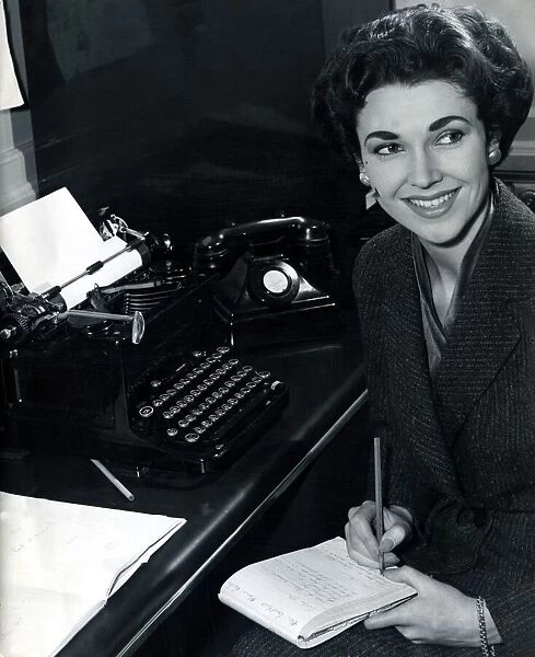Secretary taking dictation Smiling August 1955