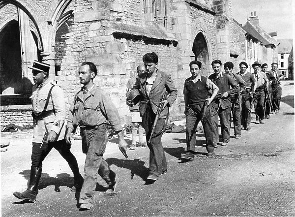 A section of the Maquis, a rural guerrilla band of French Resistance fighters during