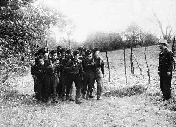 A section of the Maquis, a rural guerrilla band of French Resistance fighters during