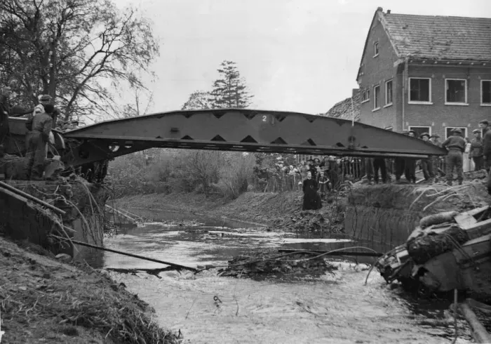 Framed Print : A self propelled Scissors'bridge laid out over a river by British soldiers Framed Print : A self propelled Scissors'bridge laid out over a river by British soldiers