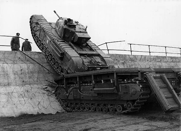 Self propelled Twaby bridge being used by a tank. June 1945