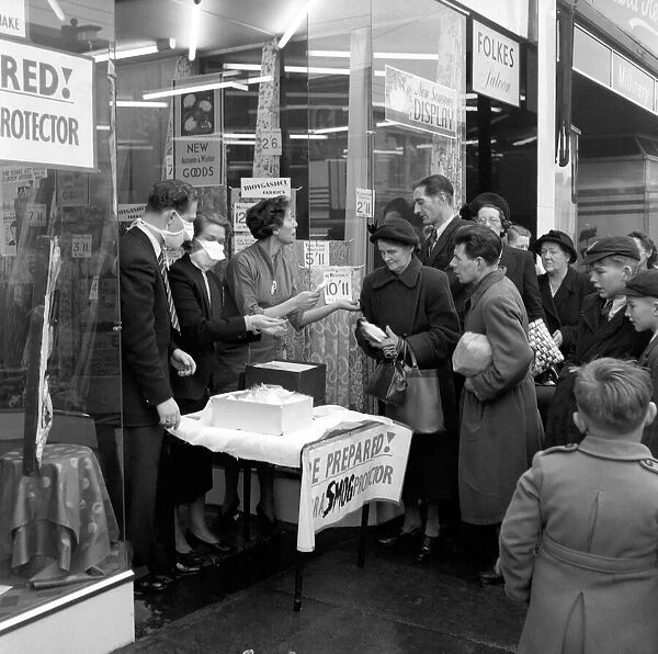 Selling Smog Mask in London. January 1953 D6497