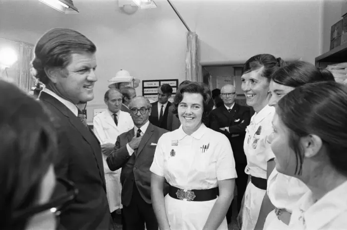 Framed Print : Senator Edward Kennedy seen here speaking to Sister Maureen Rouse (centre